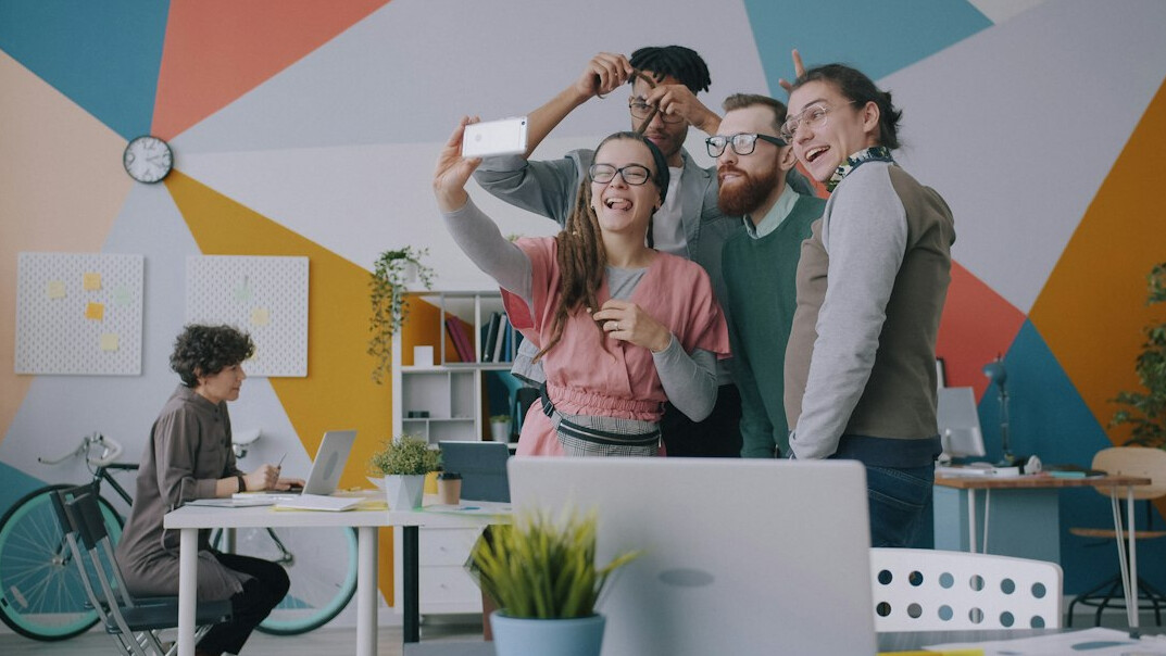 diverse group celebrating project success